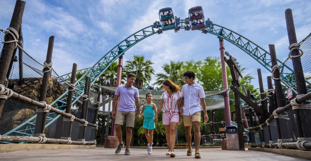 Family in front of Cobra's Curse at Busch Gardens Tampa Bay