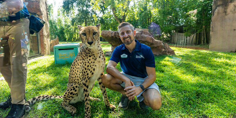 man with cheetah
