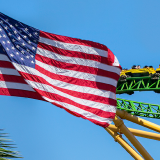 American flag and busch gardens roller coaster.