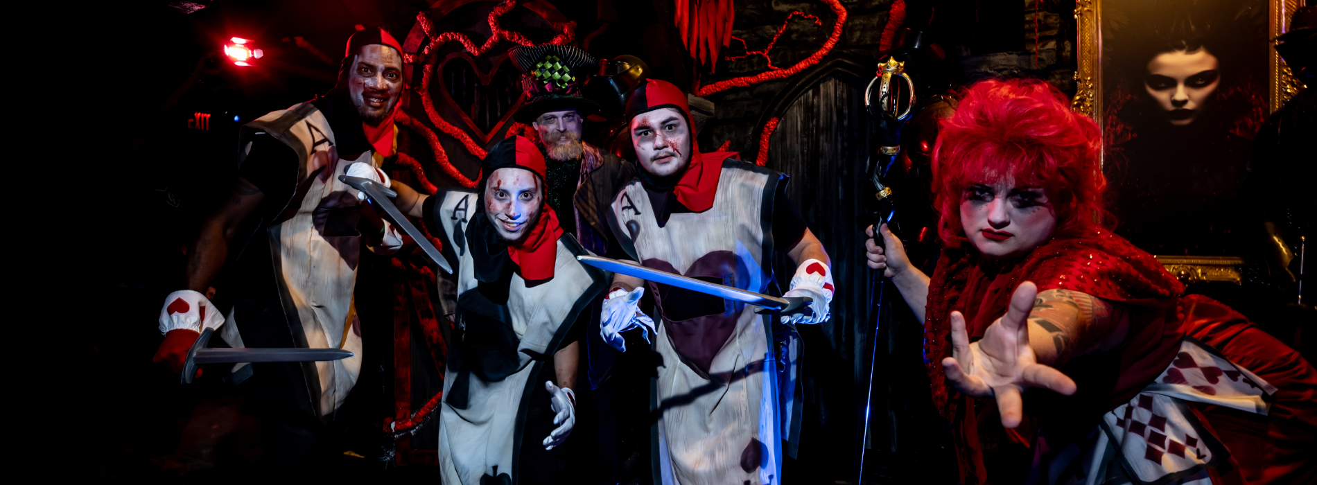 Haunted house actors dress as Alice in Wonderland characters