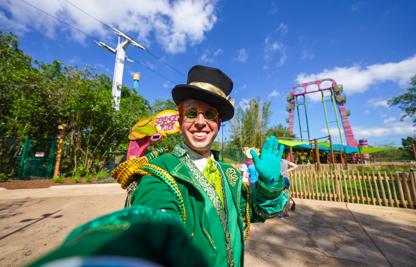 Leprechaun in front of Serengeti Flyer at Busch Gardens Tampa Bay