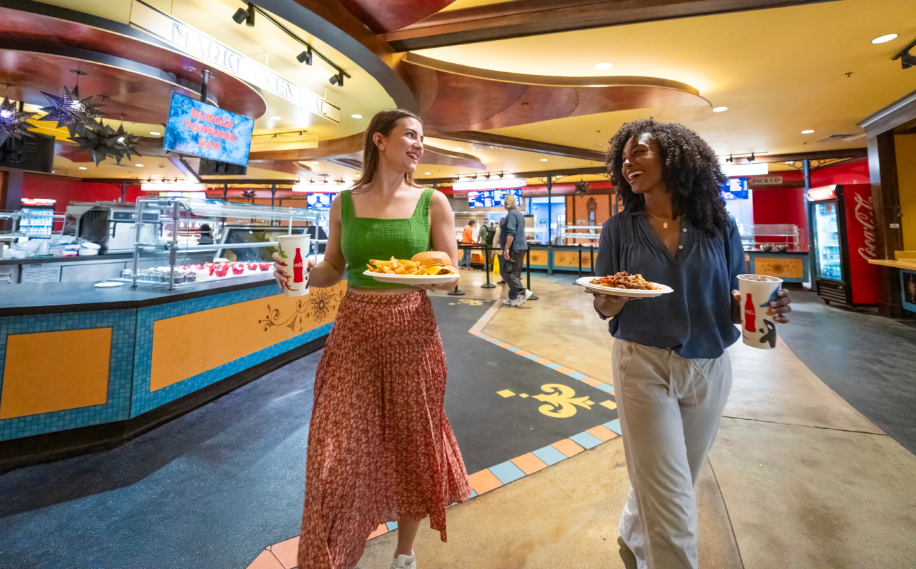 Two woman eating at Dragon Fire Grill