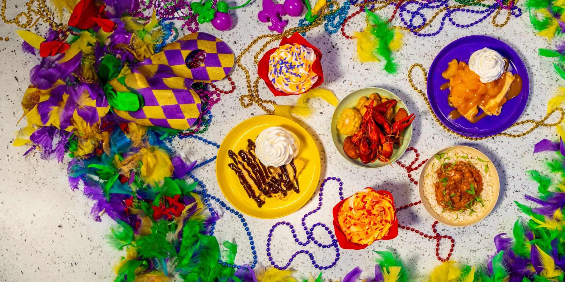 Mardi Gras-inspired offerings like Crawfish etouffee at Busch Gardens Tampa Bay Mardi Gras.