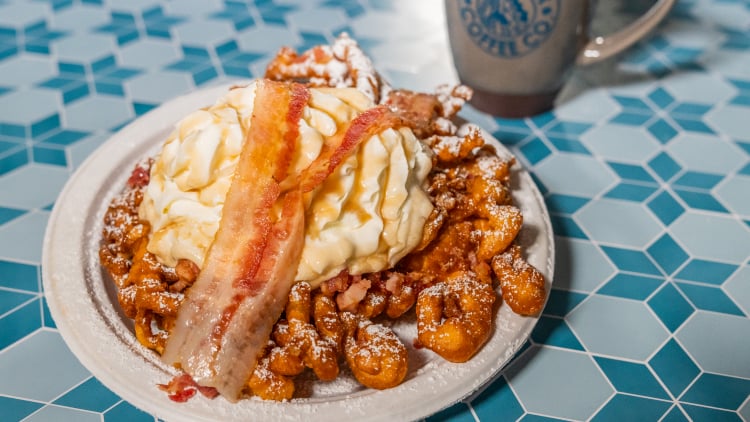 Delicious Funnel Cakes at Coaster Coffee Company proudly serving Starbucks® beverages inside Busch Gardens Tampa Bay.