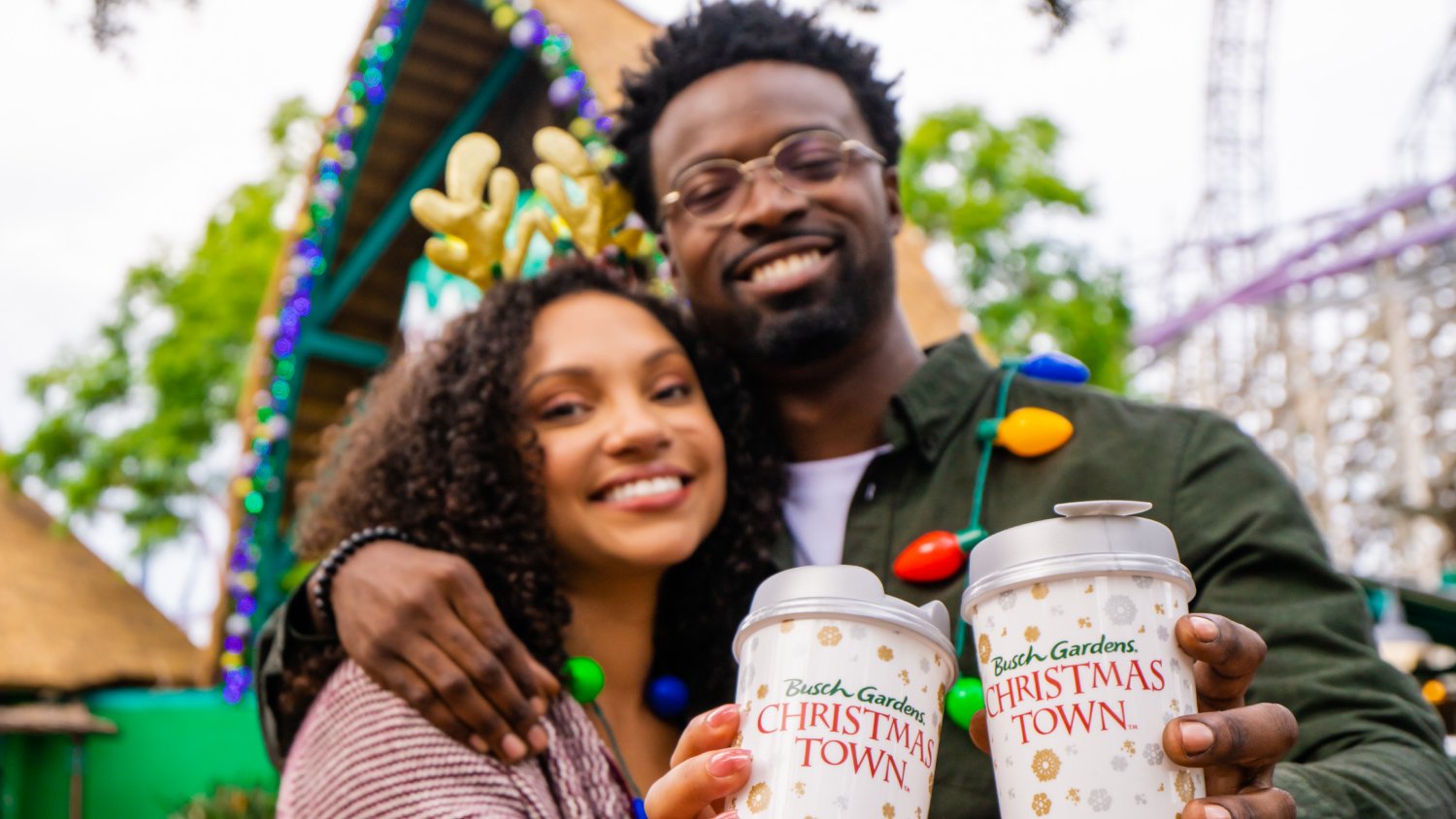 A couple enjoying Christmas Town at Busch Gardens Tampa Bay.