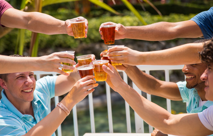 Guests toasting to free beer
