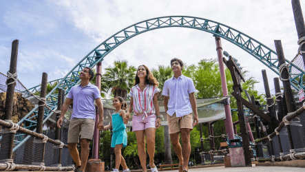 Family walking under Cobra's Curse