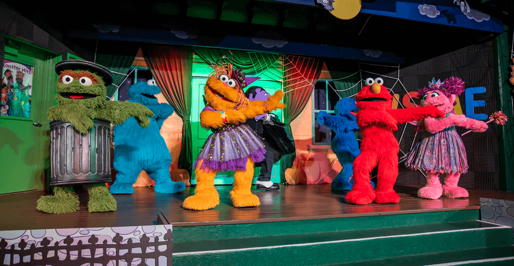 Elmo and Friends dancing at The Not-Too-Spooky Howl-O-Ween Radio Show
