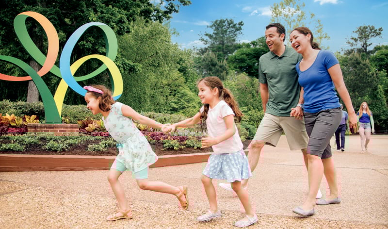 Family of four in front of Busch Gardens Williamsburg