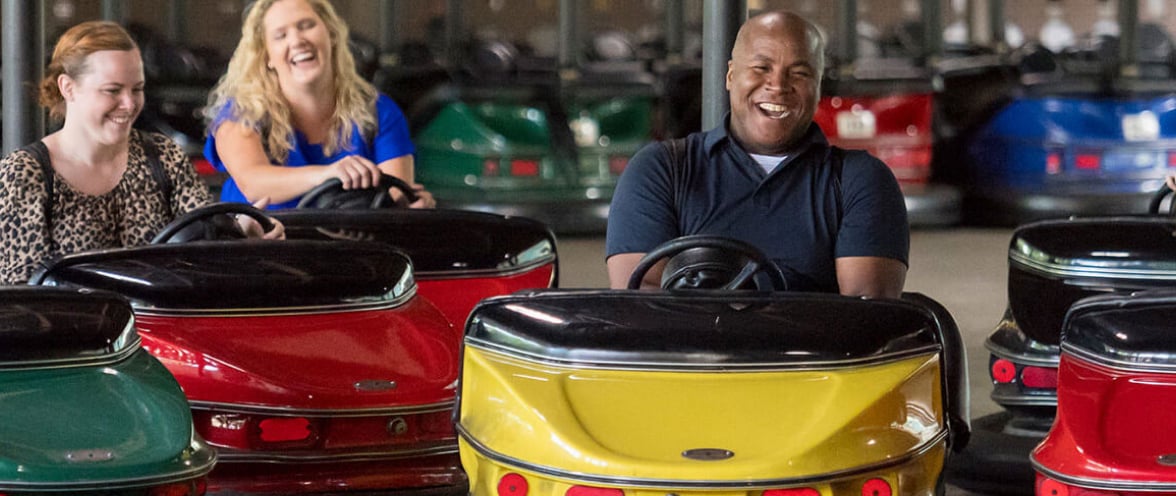 People riding Bumper Cars