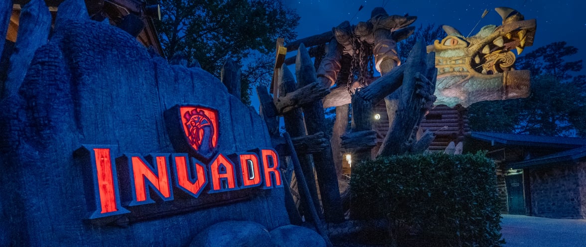 Invadr Roller Coaster Front Entrance at night
