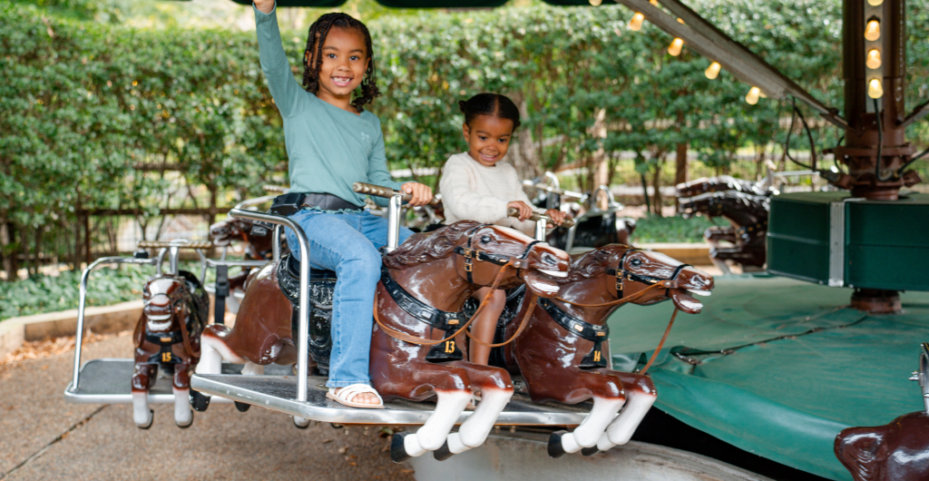Two children riding Li'l Clydes at Busch Gardens Williamsburg