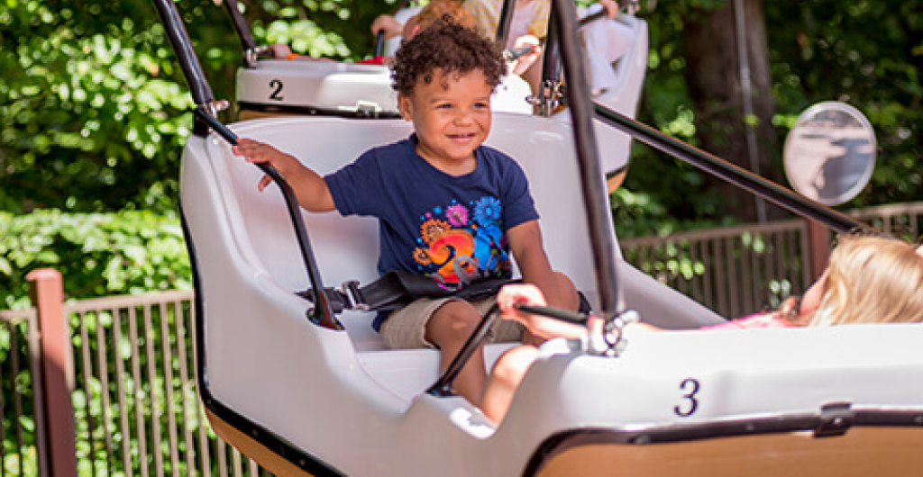 A boy on a balloon theme park ride
