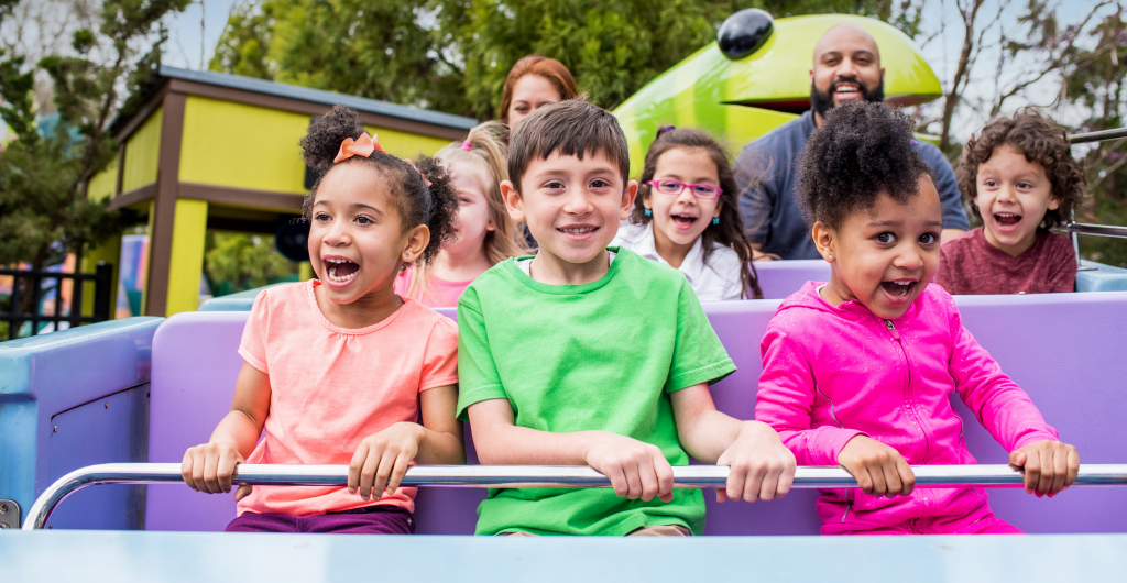 Children riding Oscar's Whirly Worms