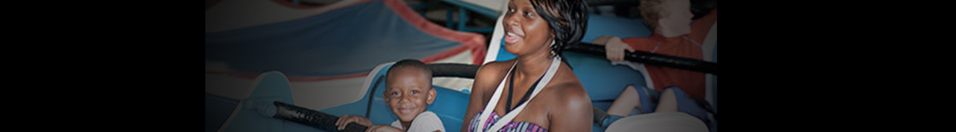 A child and an adult on Elephant Run at Busch Gardens Williamsburg