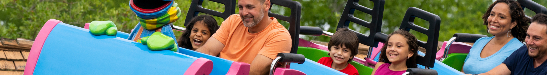 People on Grover's Alpine Express roller coaster