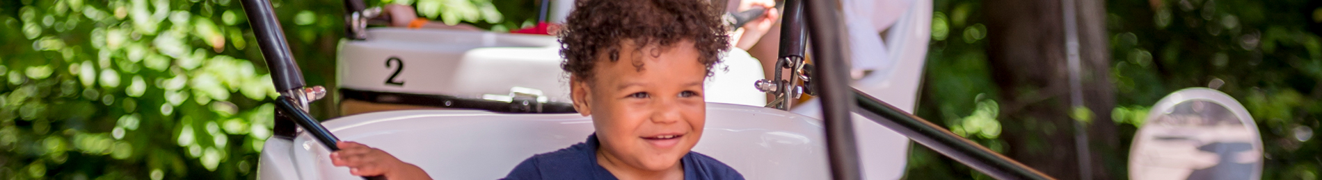 A boy on a balloon theme park ride