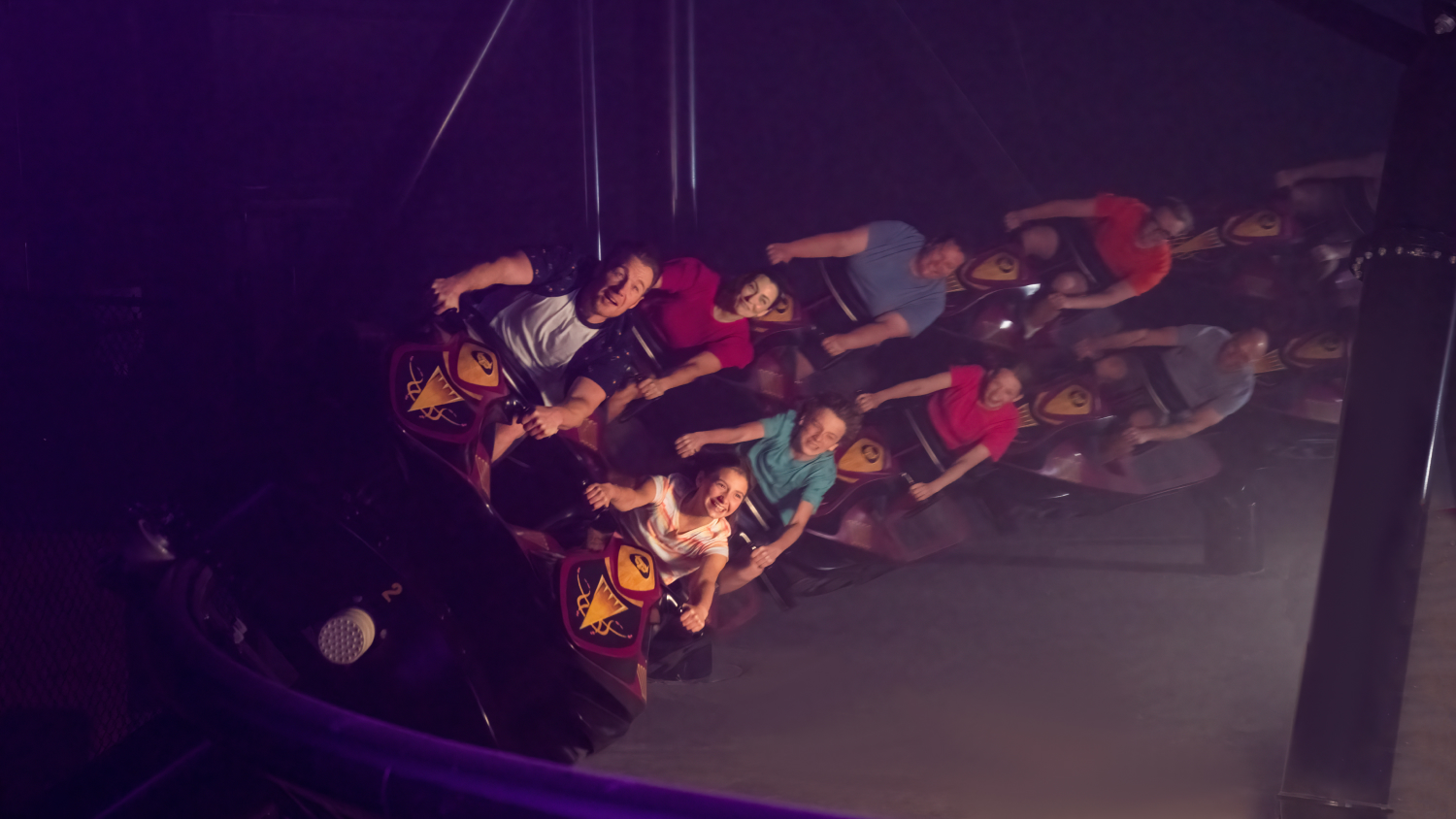 Family riding DarKoaster™ at Busch Gardens Williamsburg.