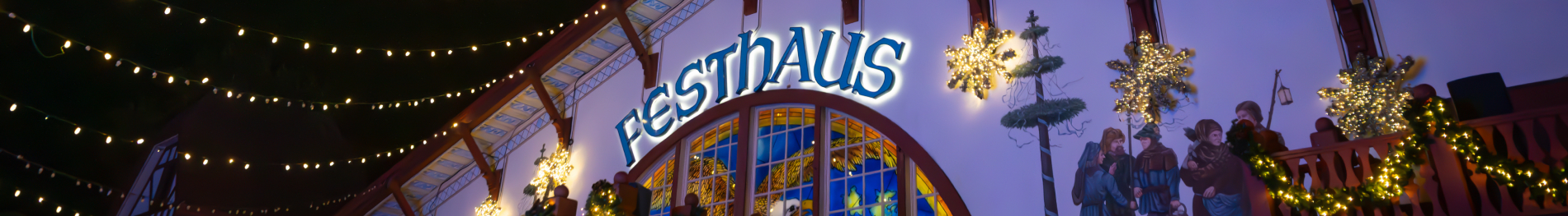 Das Festhaus restaurant with holiday lighting at Busch Gardens Williamsburg