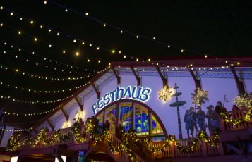 Das Festhaus restaurant with holiday lighting at Busch Gardens Williamsburg