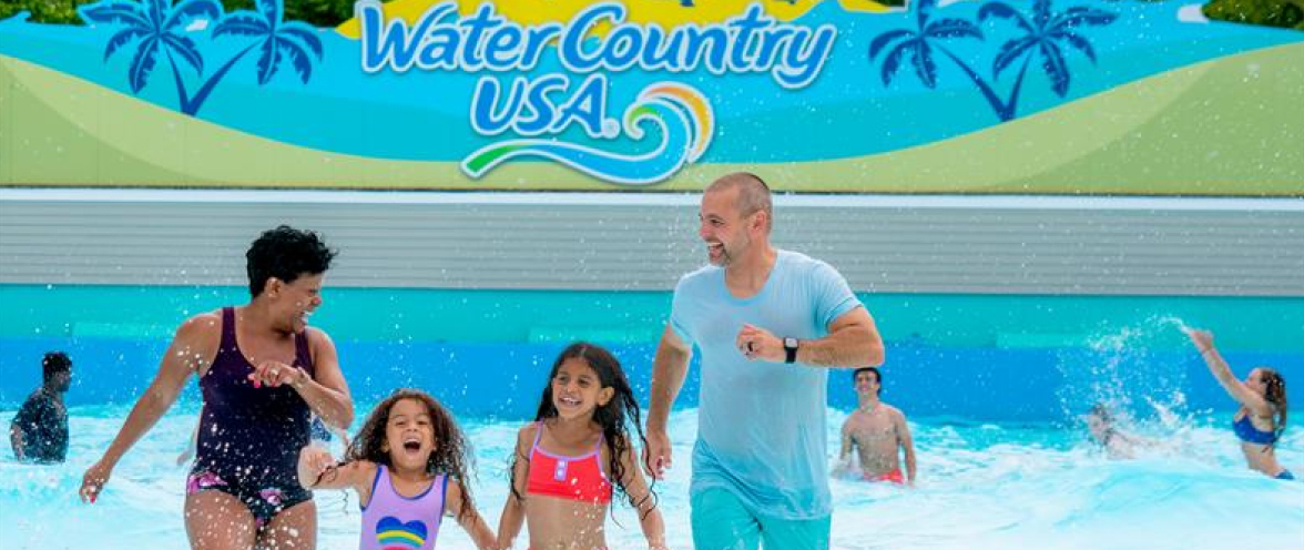 Family of four in a wave pool