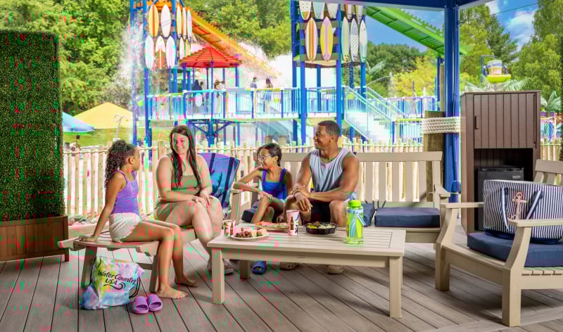 Family in a water park cabana