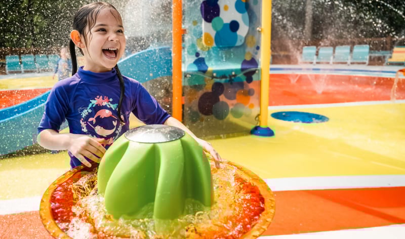 Child in a water play area