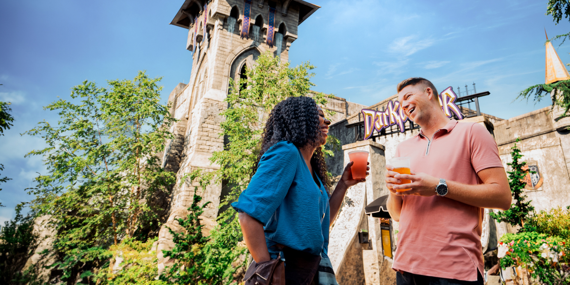 Two friends enjoying some thrills on tap at Busch Gardens Williamsburg Bier Fest.