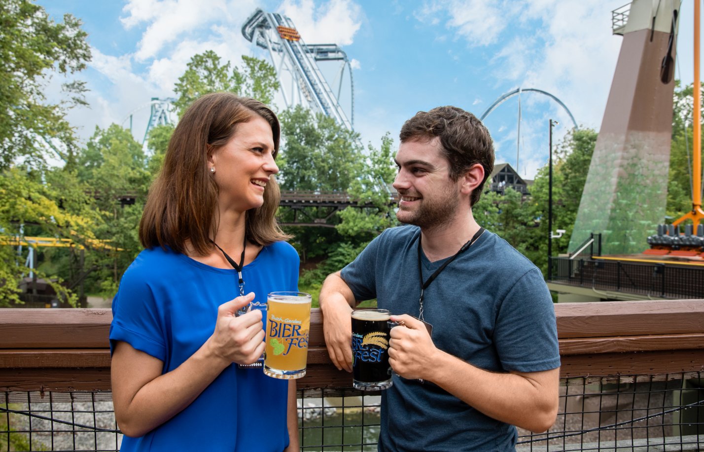 Friends enjoying sips and samples of brews from 81 different breweries throughout the event, including 34 Virginia Breweries at Busch Gardens Williamsburg Bier Fest.