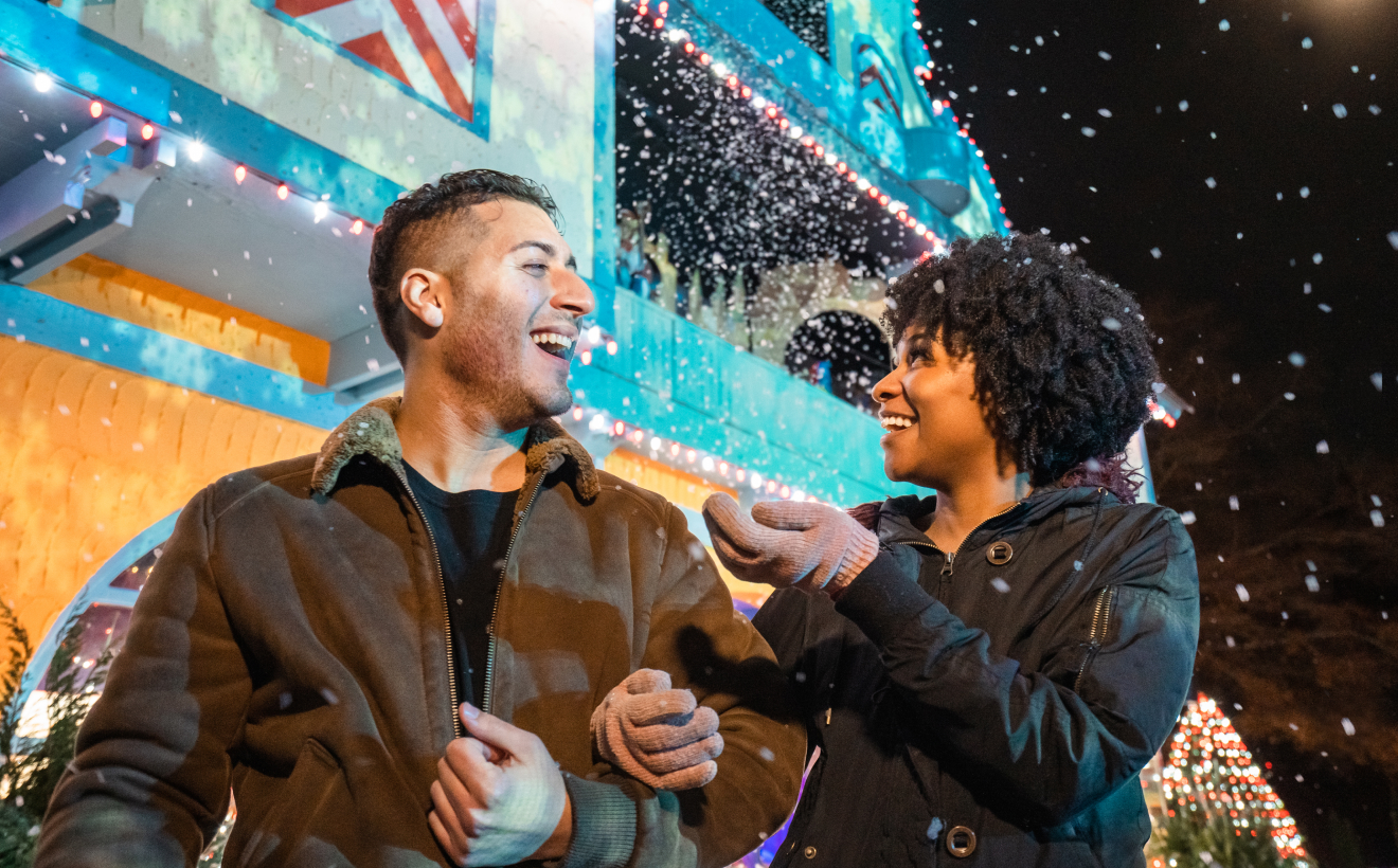 Couple enjoying Christmas Town at Busch Gardens Williamsburg.