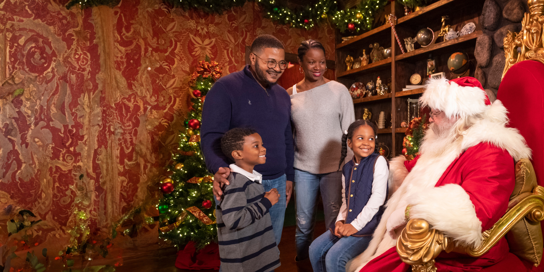 Family meeting Santa Claus at Busch Gardens Williamsburg Christmas Town event.