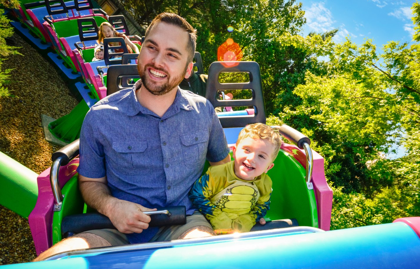 A family enjoying the Kids Play Free Vacation Package at Busch Gardens Williamsburg.