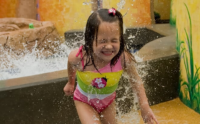 In the warmer seasons, let your kids splash about in our play areas