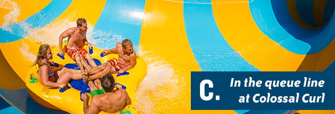 Water Country USA Quiz: Answer C - in the queue at Colossal Curl