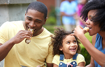 Family enjoying cannolis at Busch Gardens Williamsburg