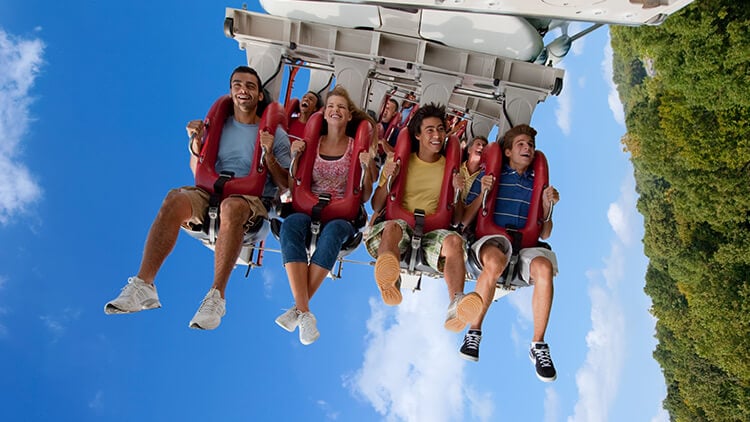 Group of teens riding Alpengeist roller coaster at Busch Gardens Williamsburg