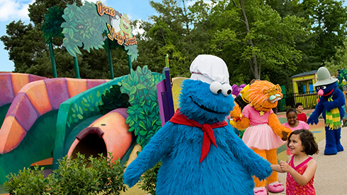 Sesame Street Forest of Fun includes a show with the characters, photo opportunities, kids rides, playground, and  water play area.